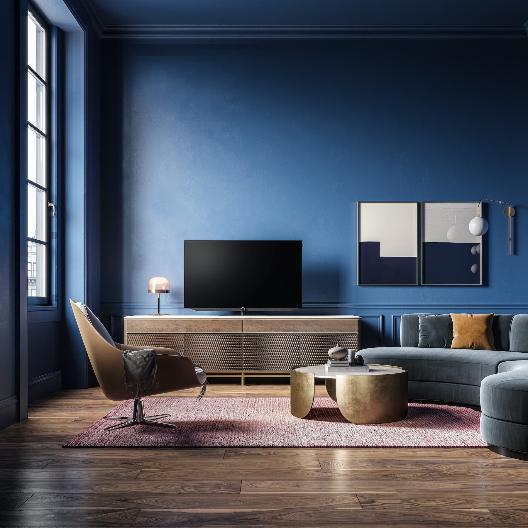 A welcoming lounge with natural materials, a rug, and sculptural lighting
